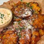 Crispy Smashed Potatoes with Garlic-Chili Butter and Parmesan