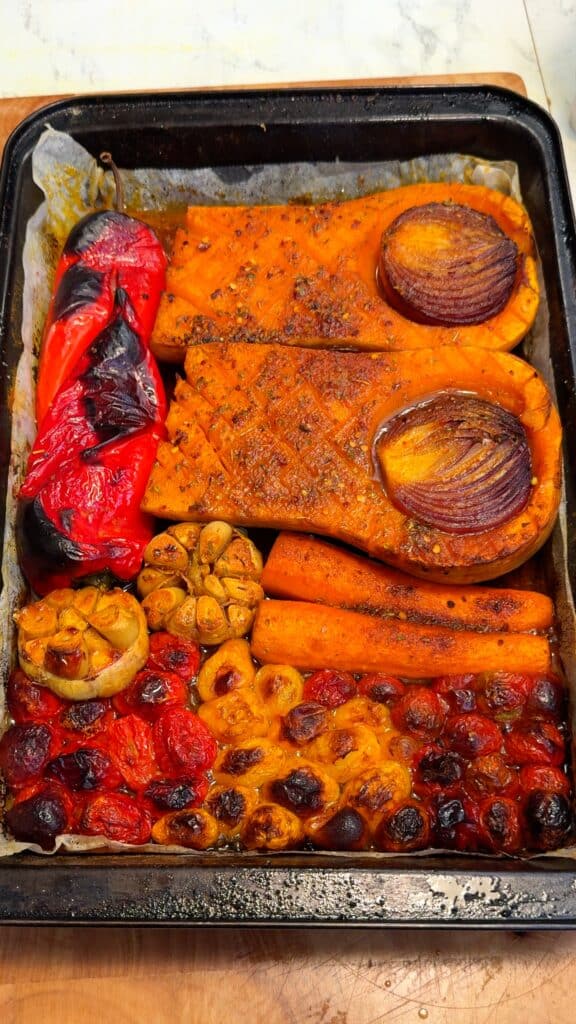 Roast your squash, onion, carrots, and garlic until caramelized and golden.