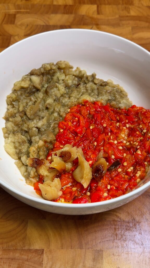 eggplant, red bell pepper and garlic in a bowl