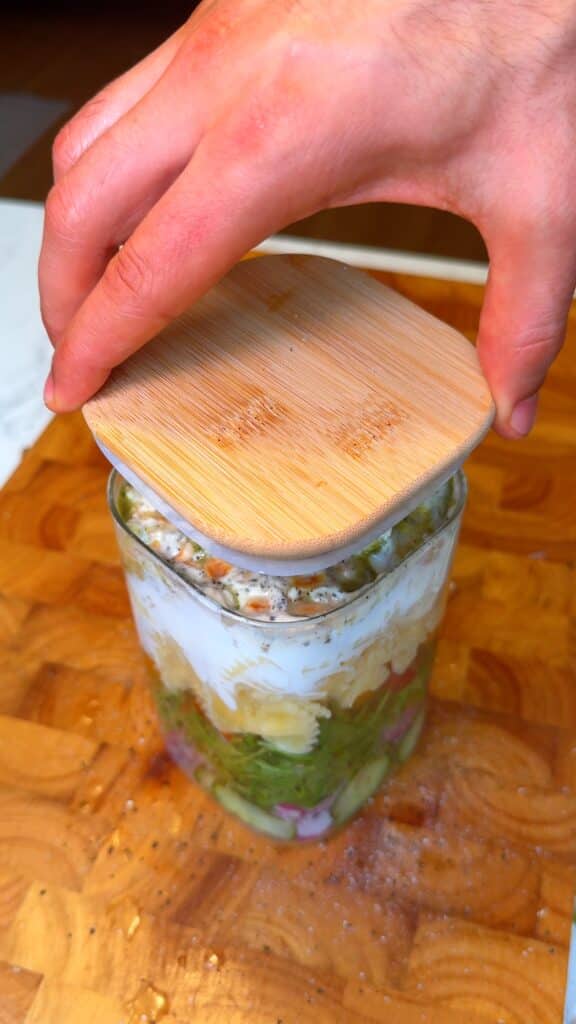 Add nuts, lemon juice, close the lid tightly, and refrigerate upright.