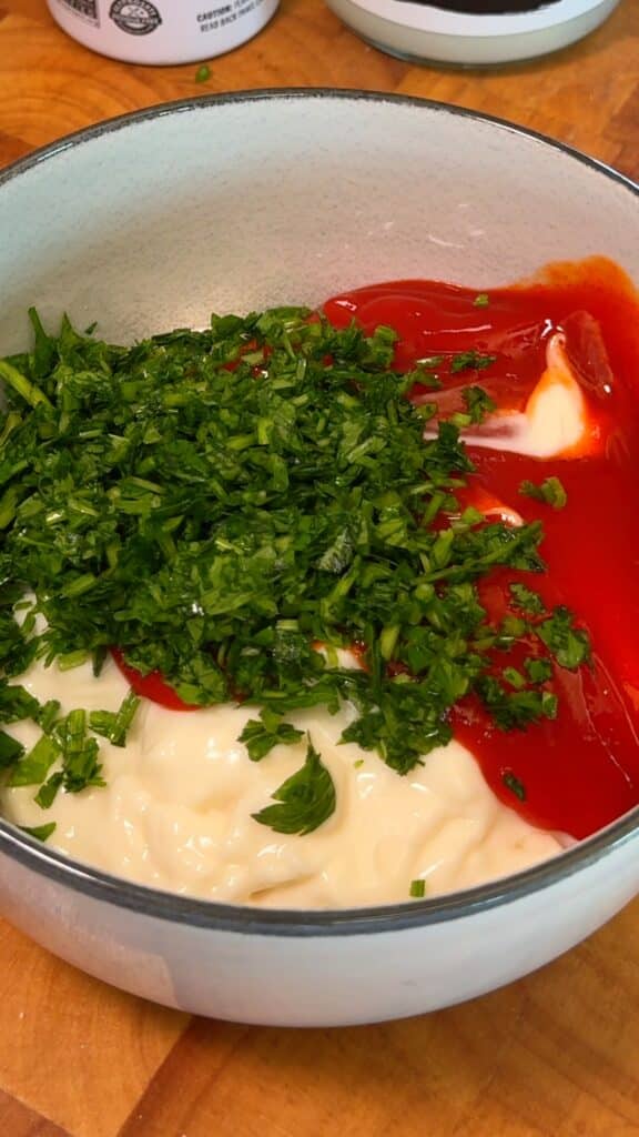 Mix together the mayo, Sriracha, parsley, and lemon juice for the dip.