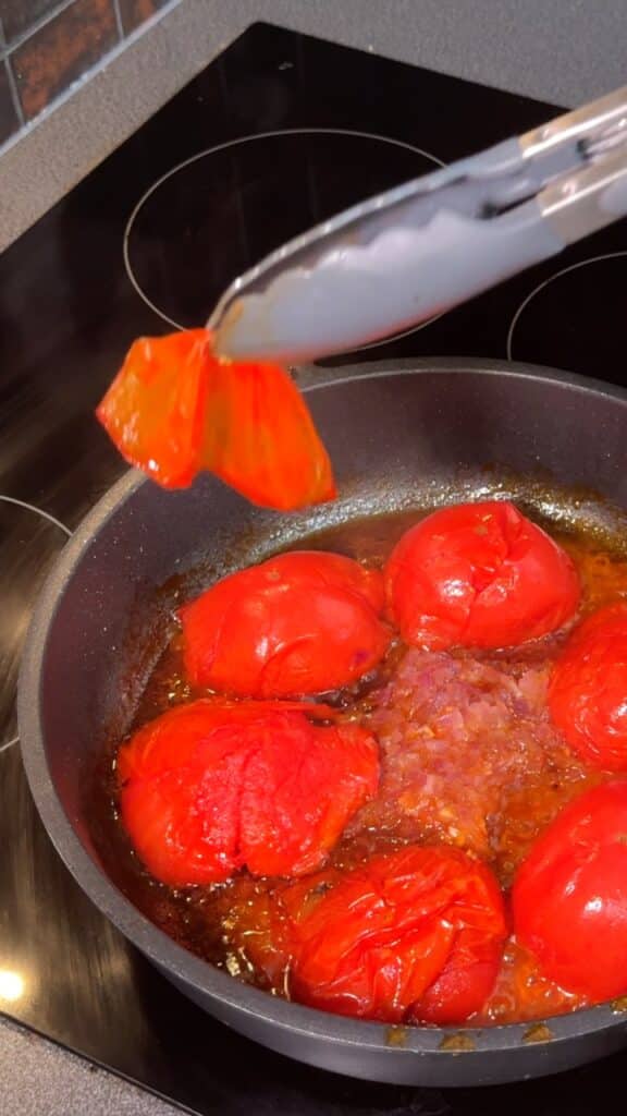 Optionally peel tomato skins for a smoother sauce