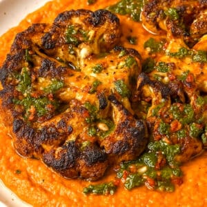 Cauliflower Steaks with Roasted Red Pepper Sauce and Chimichurri
