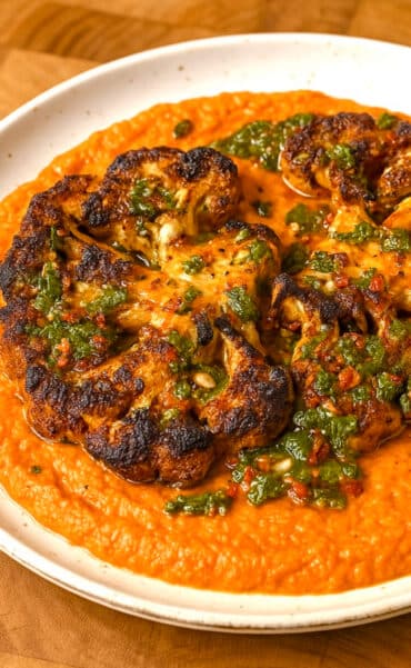 Cauliflower Steaks with Roasted Red Pepper Sauce and Chimichurri