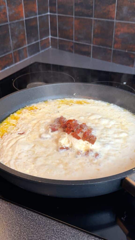 Stir in garlic and chili flakes; cook briefly until fragrant.