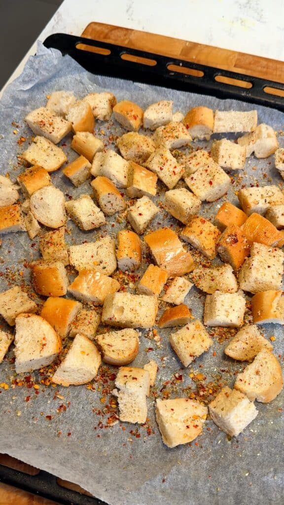 Make crispy croutons while the vegetables cook.