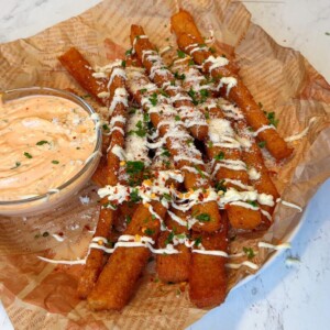 Crispy Japanese-style long fries served with vegan mayo, parsley, and dipping sauce