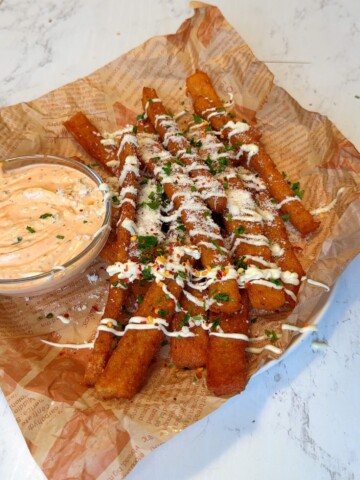 Crispy Japanese-style long fries served with vegan mayo, parsley, and dipping sauce