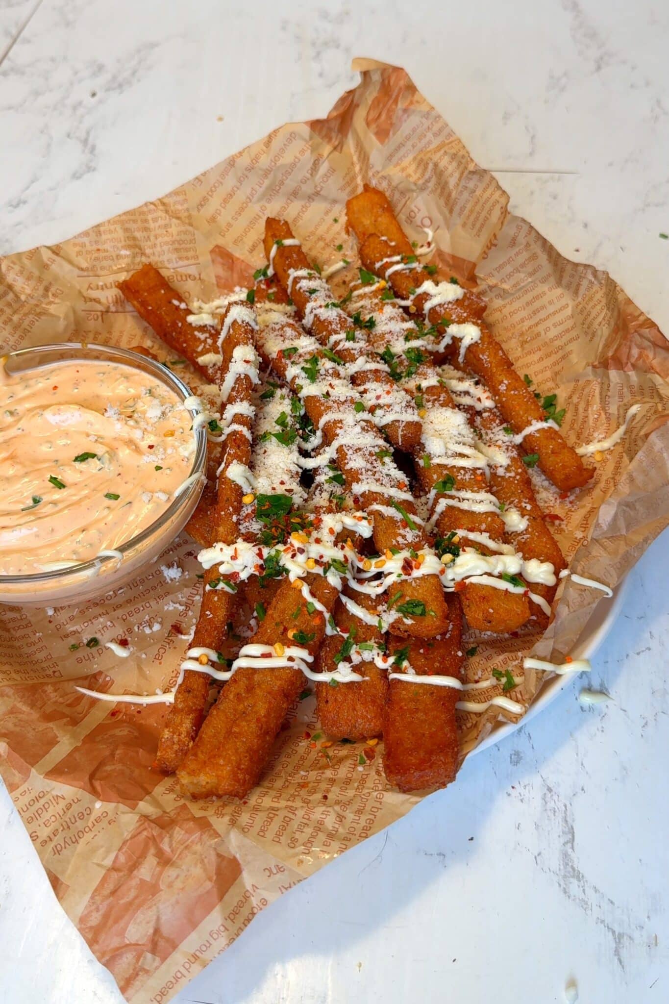 Crispy Japanese-style long fries served with vegan mayo, parsley, and dipping sauce