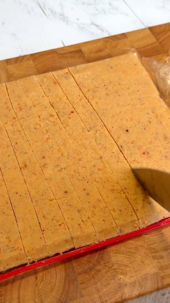 Strips of chilled mashed potato dough cut into long rectangular fries