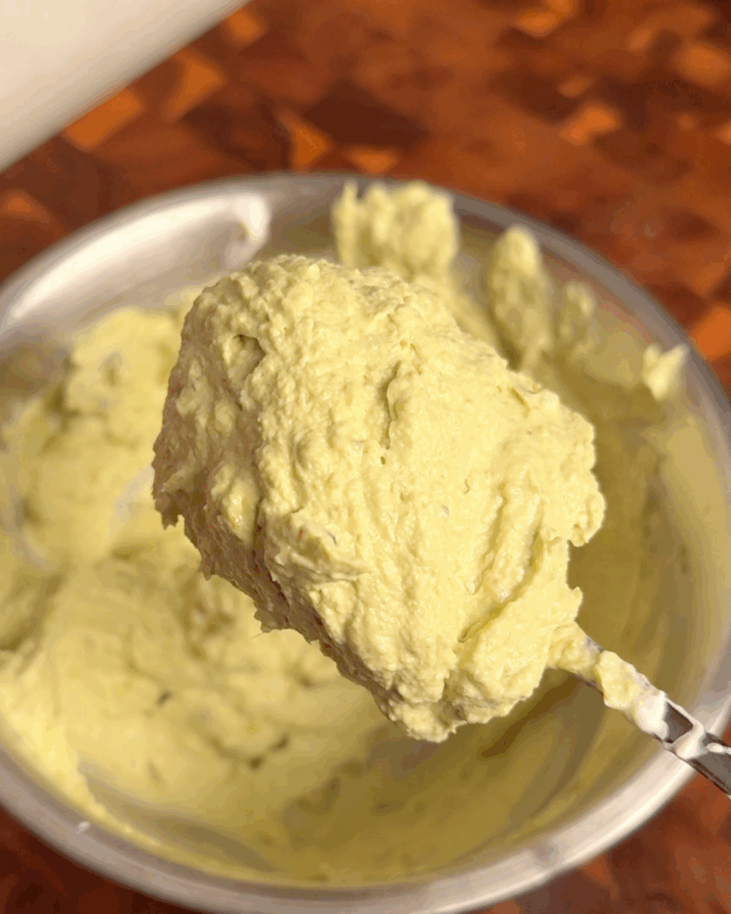 Make the pesto cream cheese filling
Mix vegan cream cheese with basil pesto and squeezed roasted garlic until smooth and creamy.