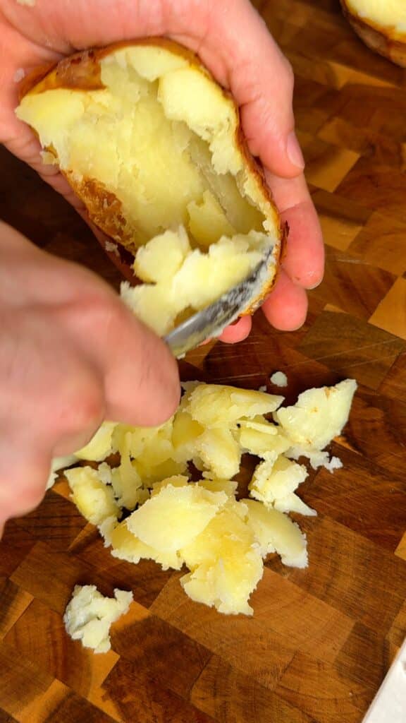 Hollow and fry the shellsScoop out the potato flesh, leaving a thin shell. Fry the shells in hot oil until golden and crispy on both sides.