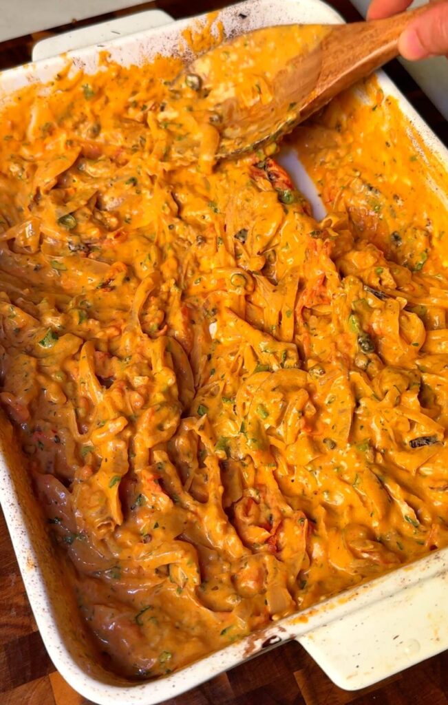 Stir until creamy Mix everything together until the cream cheese melts into a silky, creamy sauce with the caramelized onions and burst tomatoes.