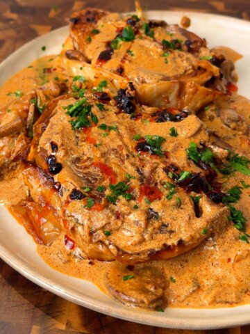 Cabbage Steaks in Creamy Mushroom and Onion Sauce