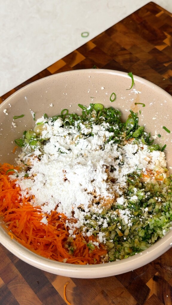 Make the fillingCrumble firm tofu into a bowl. Add shredded carrot, shredded cabbage, sliced spring onions, garlic, ginger, soy sauce, and cornstarch. Mix with your hands until everything holds together when pressed.