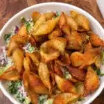 Crispy pasta salad topped with golden air fryer pasta chips