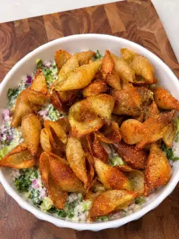 Crispy pasta salad topped with golden air fryer pasta chips