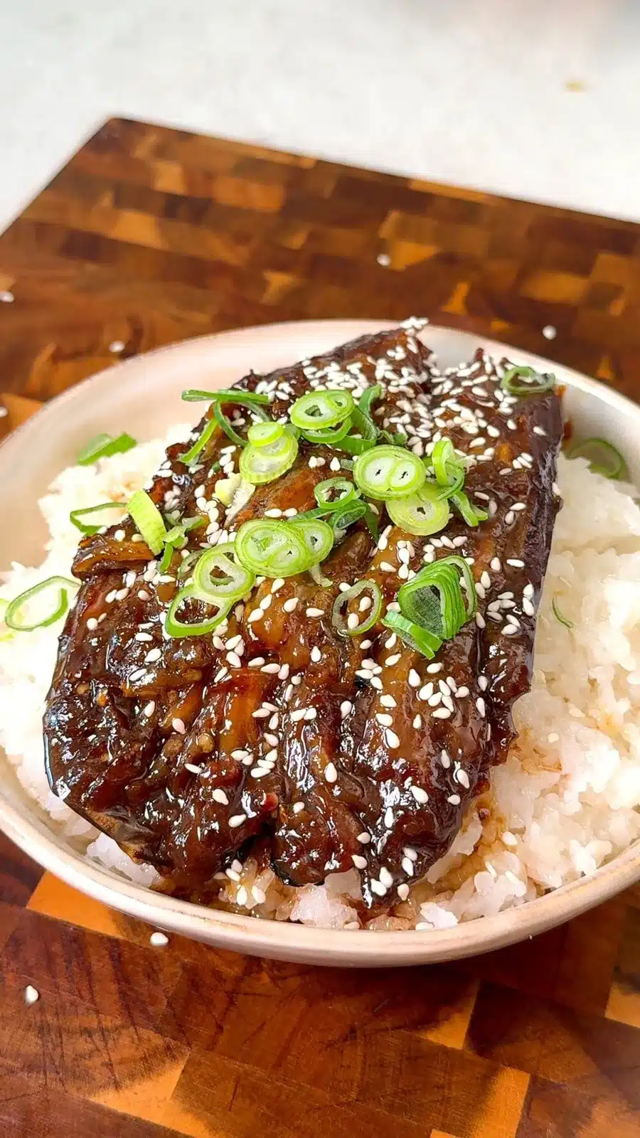 Eggplant unagi rice bowl glazed in sweet soy sauce with sesame and spring onion