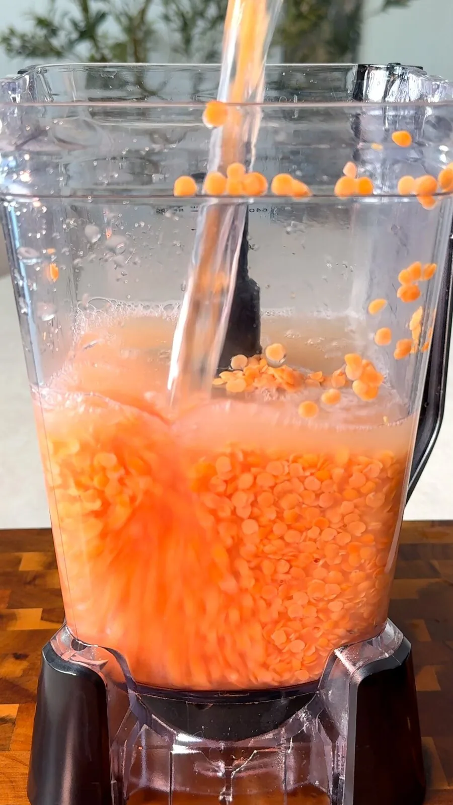 Red lentils blending into a smooth pourable batter