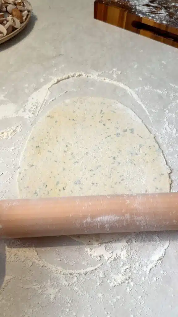 Potato dough rolled into a thin round